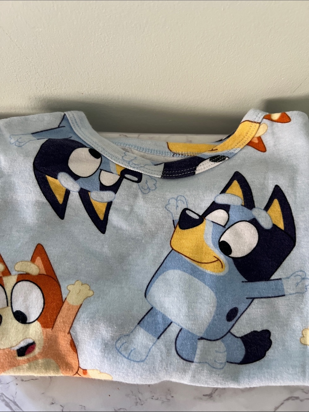 Bluey Kids Pajama Top - Light Blue with Navy & Yellow Characters